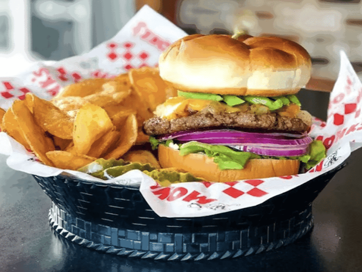 Monk's Bar & Grill signature dishes Original Monk's Burger
Classic Cheeseburger
Chicken Tender Wrap